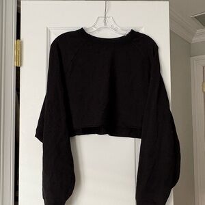 Black Alo Yoga cropped & raw hem pull over